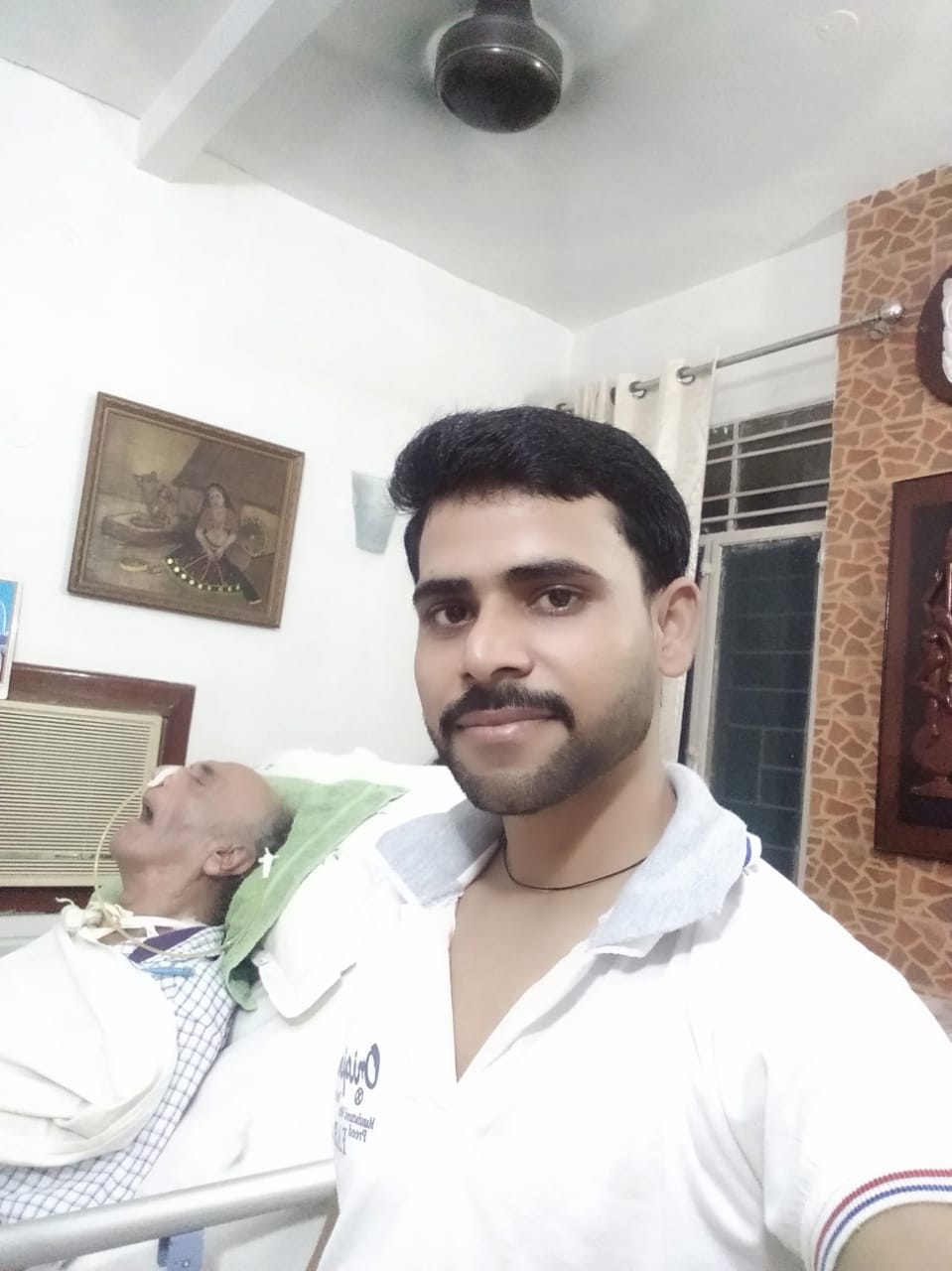 Caregiver smiling while checking on patient